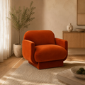 Azalea rust orange performance velvet accent chair in a warm contemporary living room