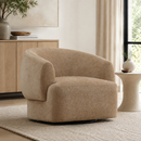 Billie swivel chair in sand chenille styled in a warm modern living room
