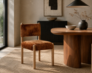 Bruno Bronze Performance Chenille Dining Chair in an upscale dining room — AI-generated lifestyle image