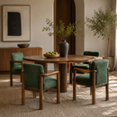 Irma forest green performance velvet dining chairs in an upscale dining room