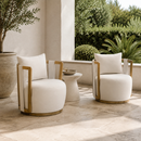 Paolo Cream Upcycled Basketweave Fabric Outdoor Accent Chair styled as a pair on an upscale covered patio