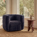 Robson Swivel Chair in Navy styled in an interior
